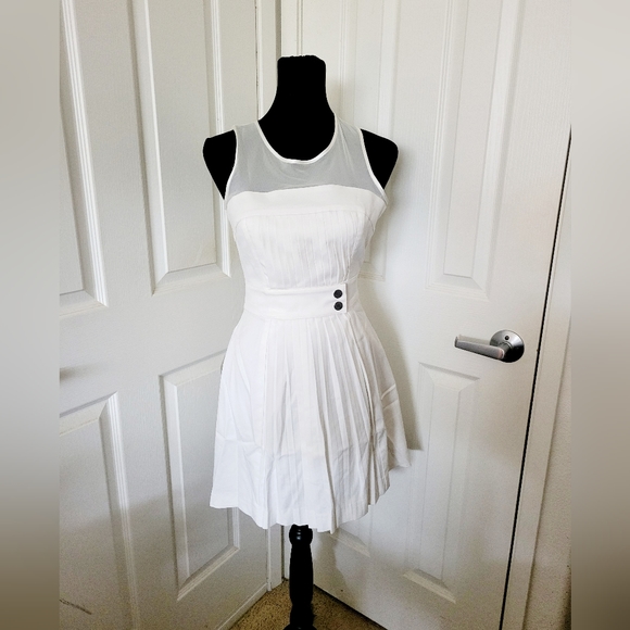 bebe Dresses & Skirts - Bebe | Cute Ivory Pleated Sleeveless Fit & Flare Cocktail Dress
